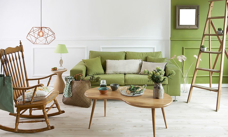 Green living room colors with green couch makes a beautiful modern green living room