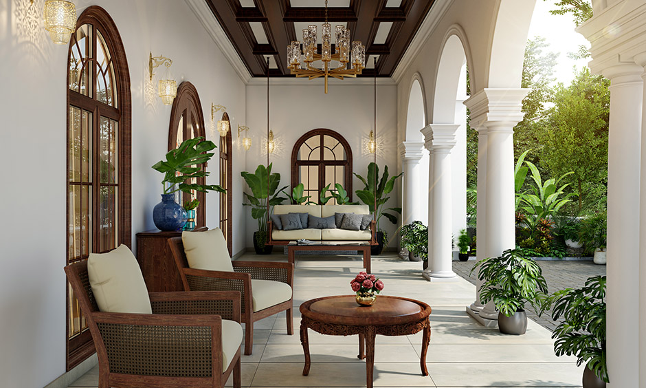 Wooden ceiling, elaborate wrought iron lights and golden accents, binds this home porch design to perfection.