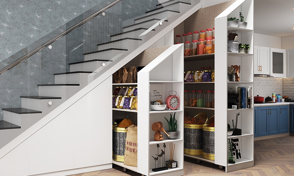 Kitchen pantry design with a dead space under the staircase transformed into a clever pull out kitchen pantry design