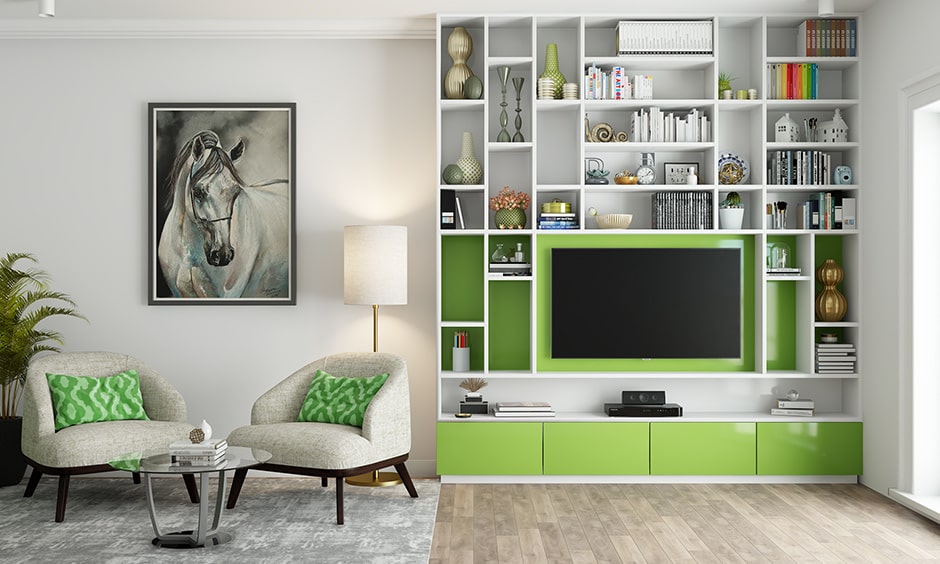 Green living room with a tv unit in olive green and white colour