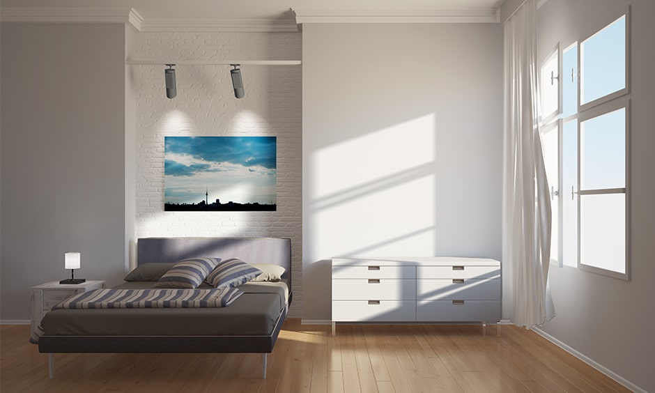 Minimalist bedroom ideas with a murphy bed that can be pushed back to the wall