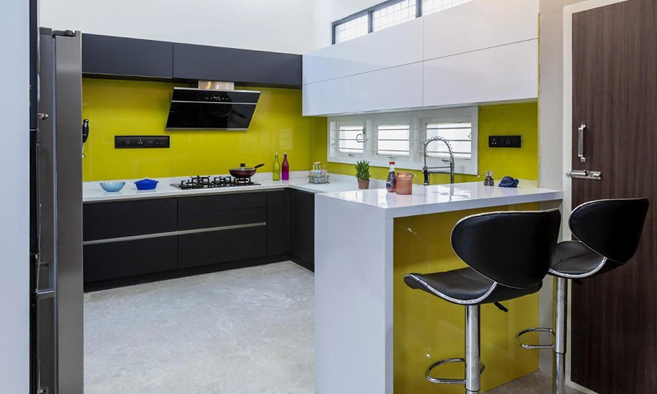 Modern sleek kitchen comes with a breakfast counter