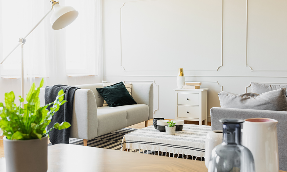 White side table portrays elegance, simplicity and cleanliness and perfect balance between form and function for  living room