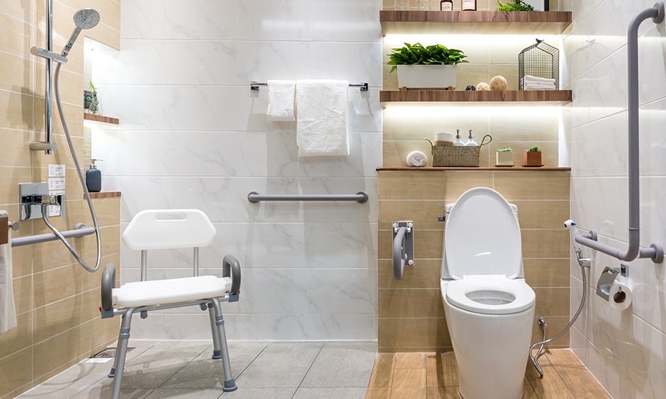 Senior citizen bathroom design with a resting chair below the shower