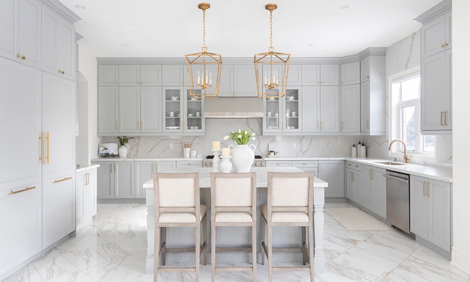 White kitchen cabinets with granite flooring is perfect fit for white cabinets