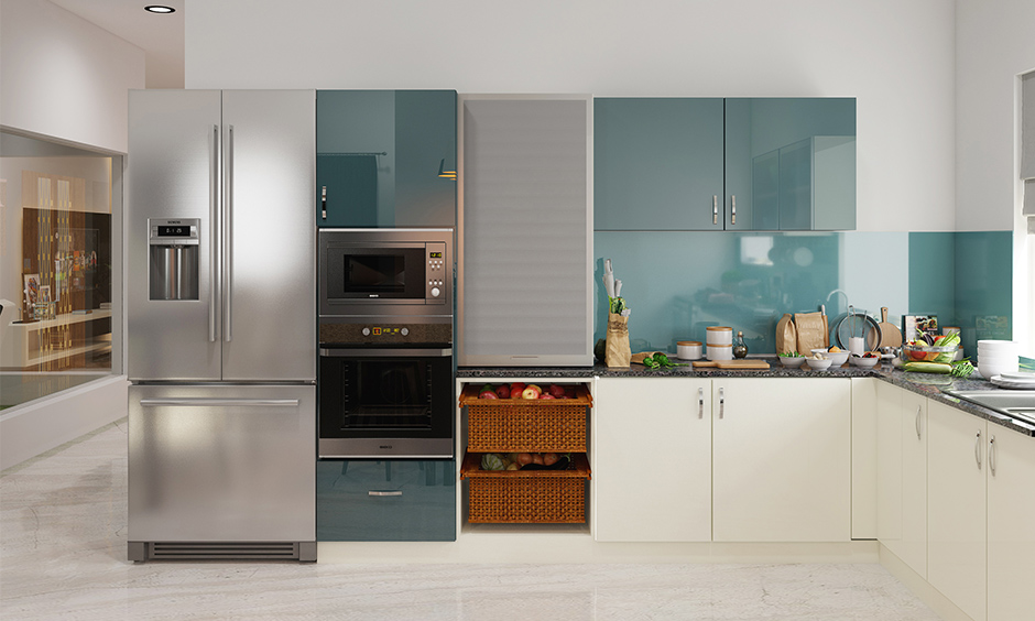 Modern kitchen with Corian countertop and sleek kitchen cabinets in lacquered glass for easy storage access.