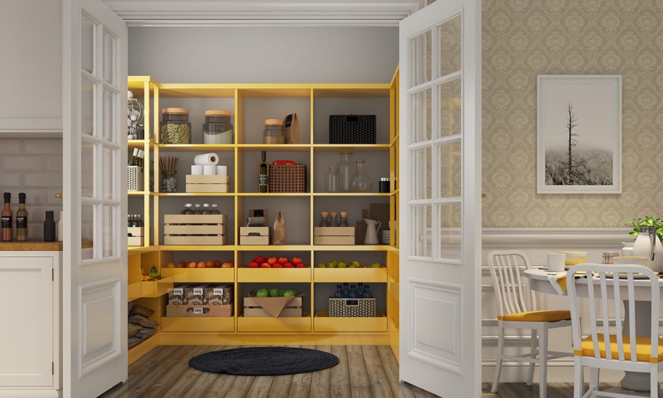 Kitchen pantry design with yellow painted kitchen pantry to store groceries and greens