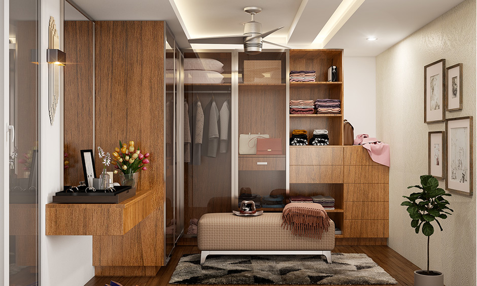 Classic wooden cupboard design for dressing room complete with drawers, shelves and glass cabinets for storage