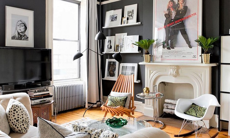 A grey and white living room reflects the eclectic lifestyle