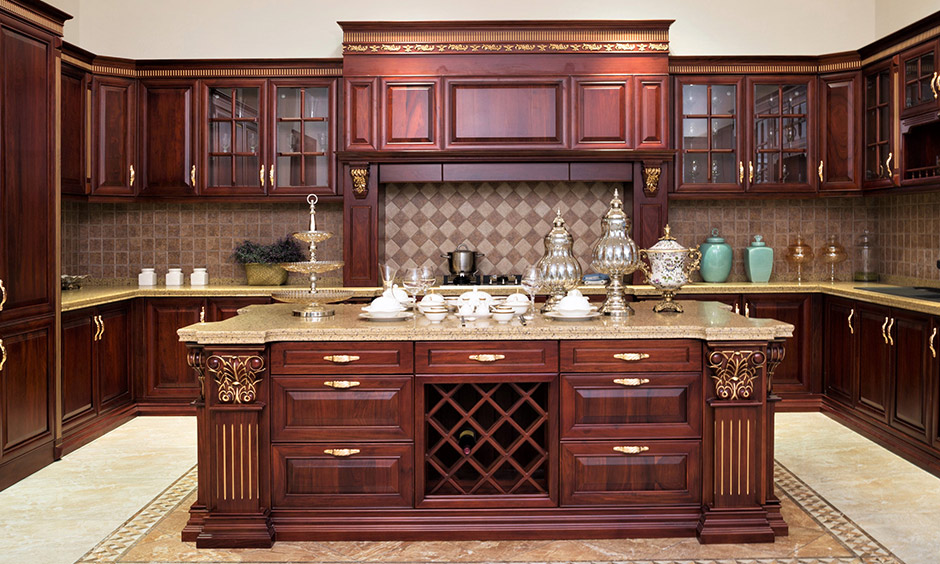 Elegant dark wooden corner kitchen cabinet lends a very farmhouse-like and naturally rustic look to the kitchen’s landscape.