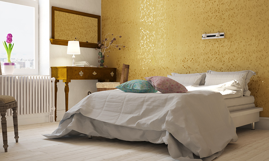 Gold wallpaper designs singlehandedly brighten up your bedroom's interior designs and infuse glamour and charm