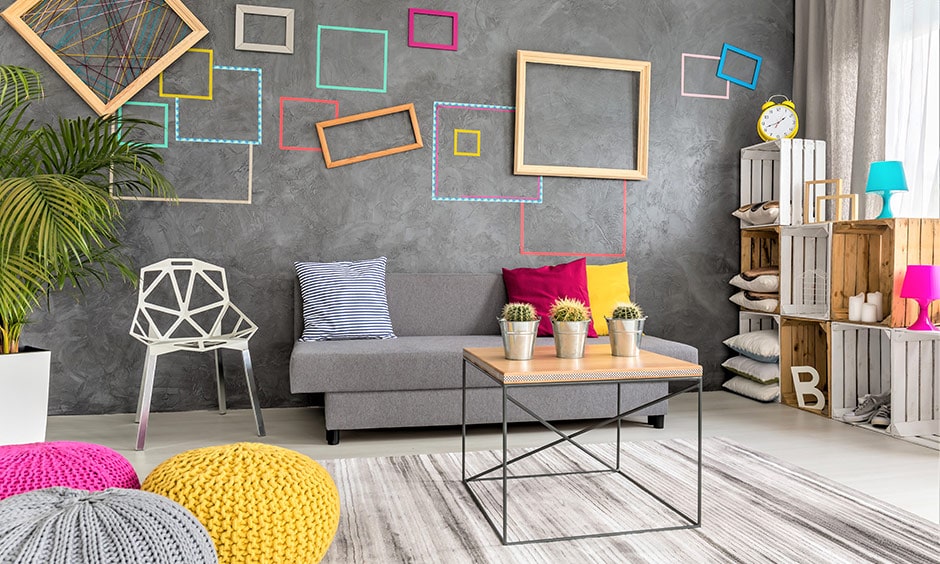 Grey living room idea with colorful photo frames for modern lifestyle couples