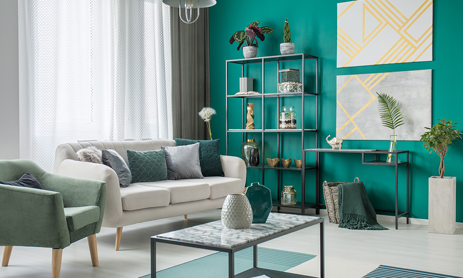 Emerald green living room accessories, indoor plants work as mesmerizing accessories and grant feel-good vibes