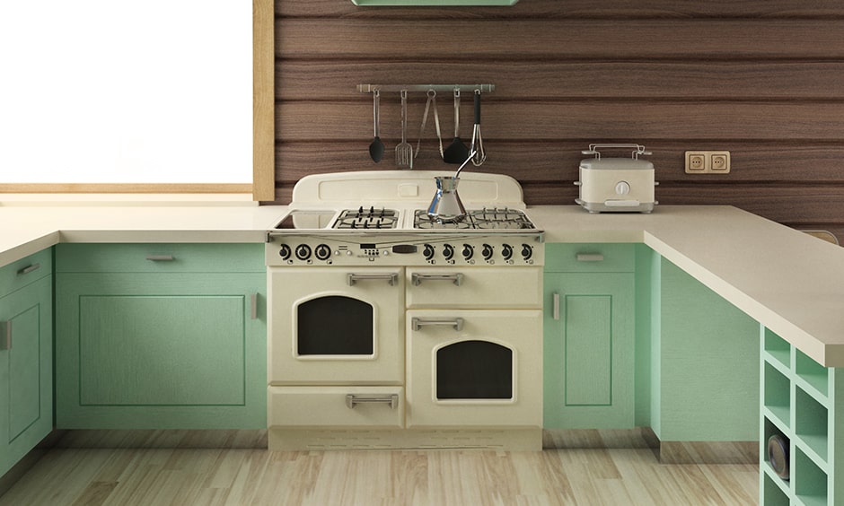 Retro kitchen design in pastel green with dual ovens