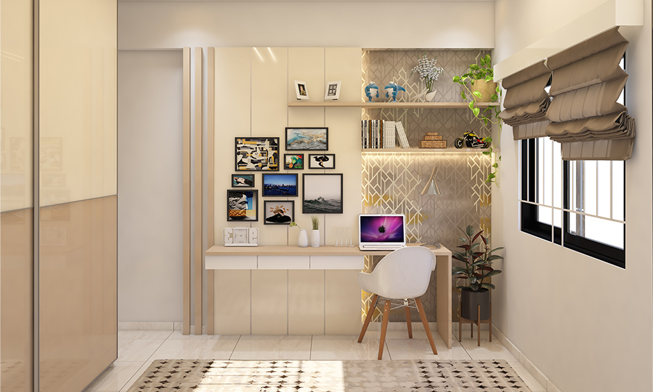 This room has a study table created with backlit rafters and a work desk with spotlights interiors in ramagodanahalli