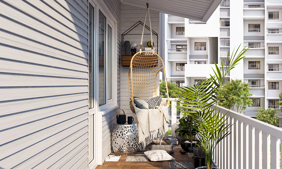 A chic hammock or a fun swing will give your small balcony a laid-back vibe is a great small balcony design