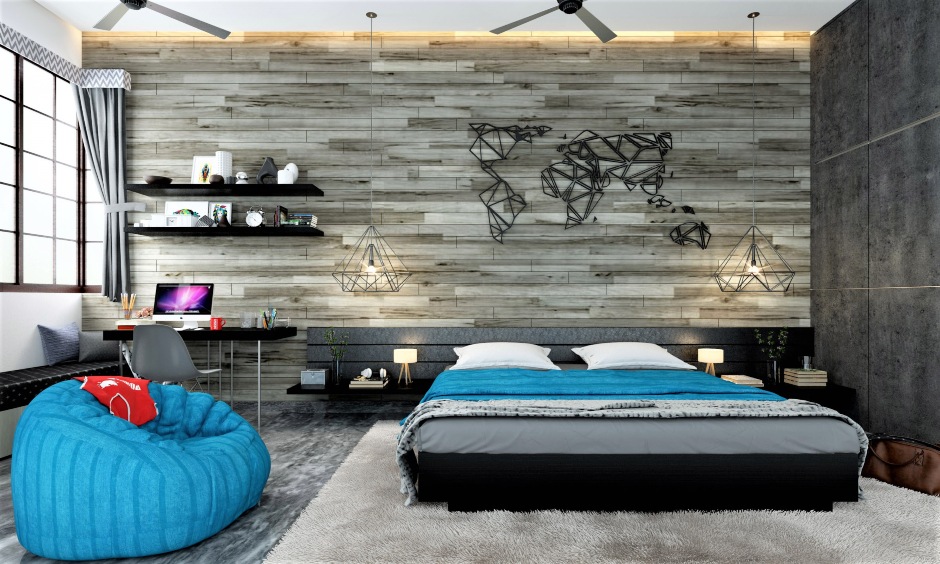 Black low floor bed designs with the grey-themed interior and handcrafted steel world map on the wall give satisfaction