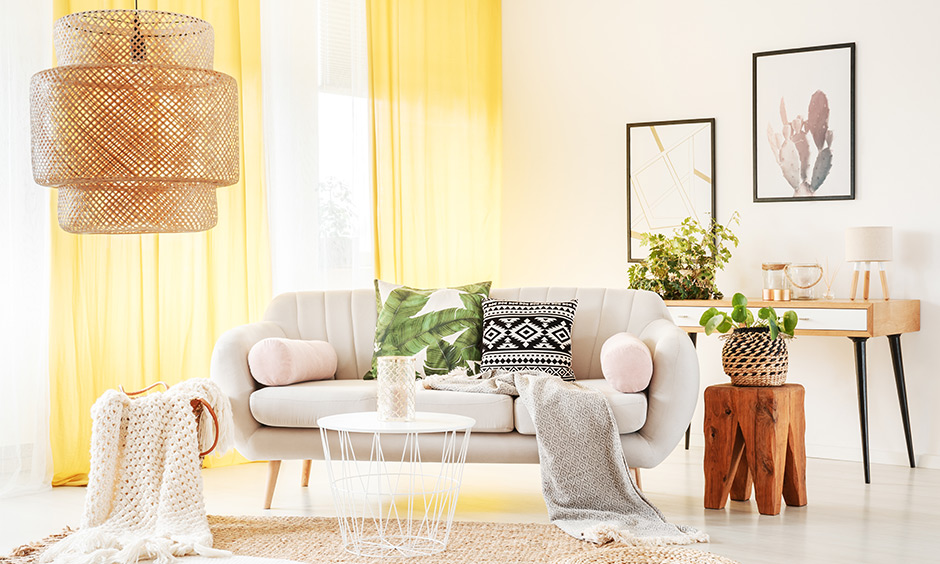 Unique bohemian design with canary yellow curtains and furniture in neutral colours