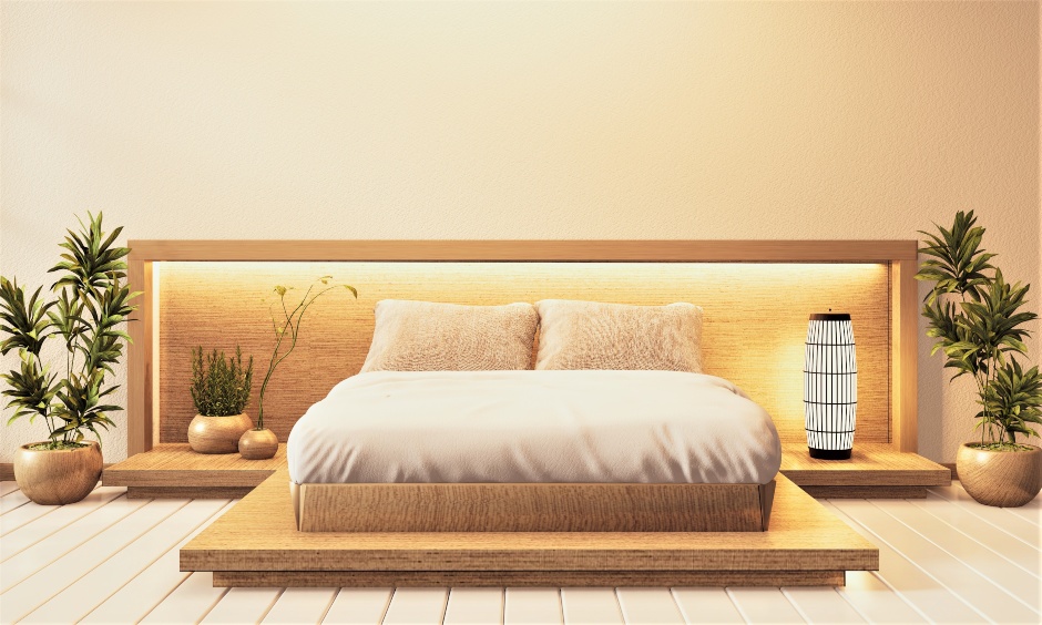 Japanese-style low floor double bed designs with natural-toned colours of the frame and mattress look peaceful