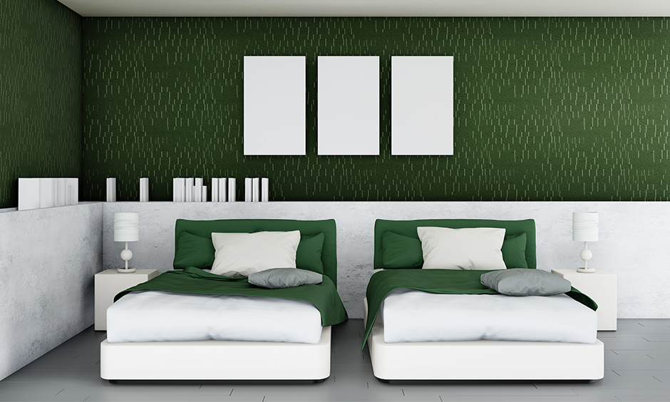 A twin bedroom in green with beautiful bold yet dark shade you will never want to leave