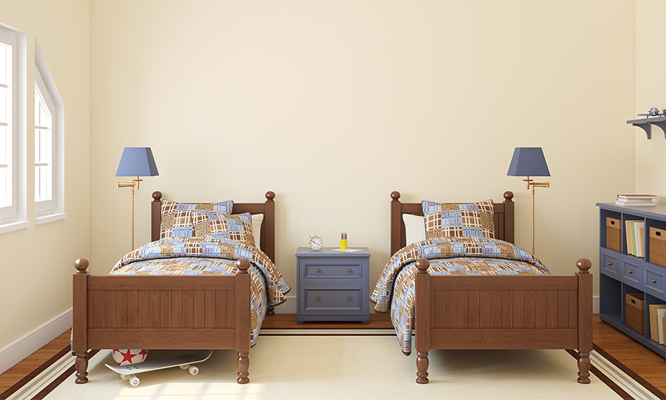 Boys twin bedroom set made from dark wood and twin lampshades