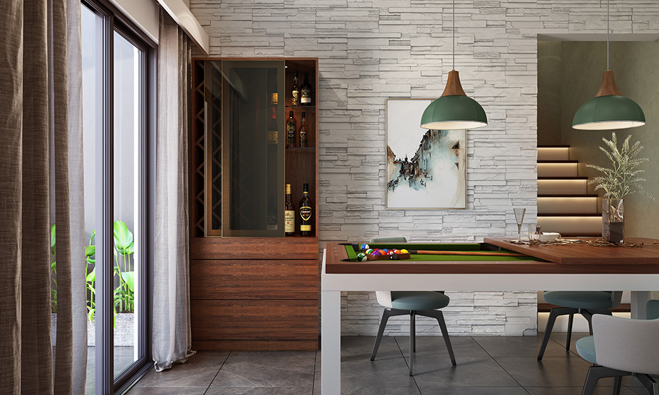 Game room decor in the dining room with a stunning pool table that doubles up as a dining table too.