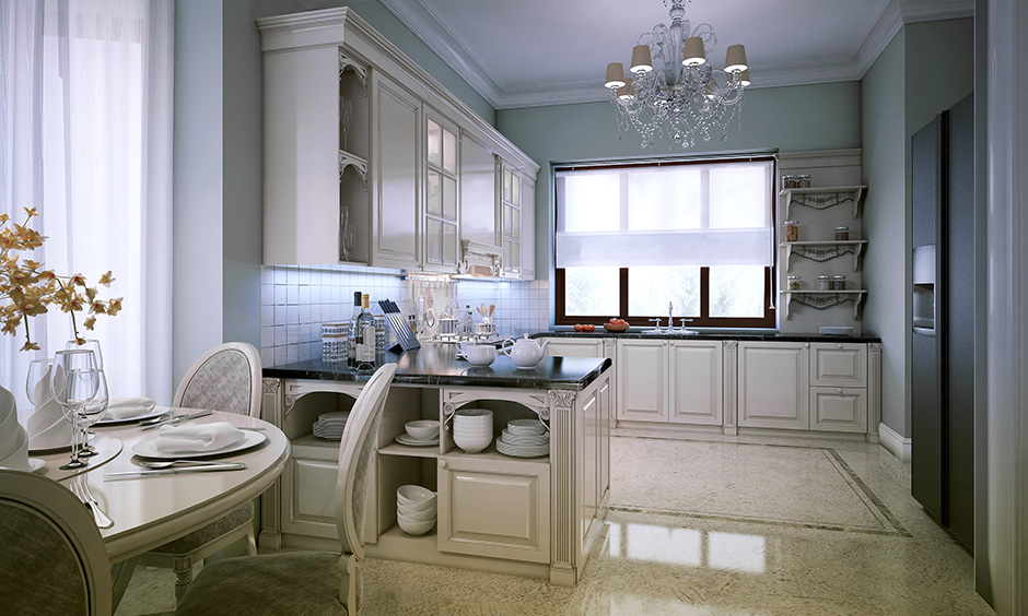 Modern kitchen lighting with a charming crystal chandelier looks elegant.