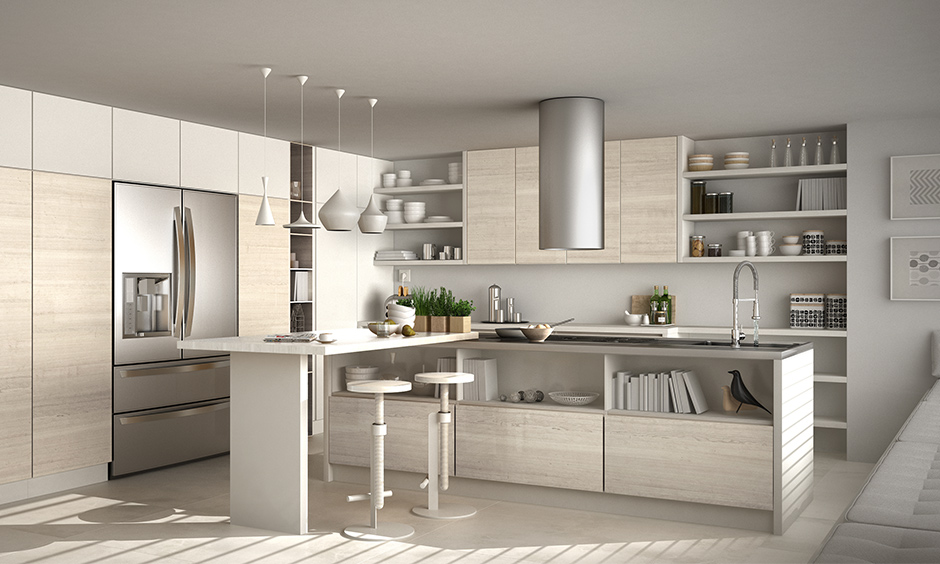 White luxury modular kitchen has fancy drop lights, bookshelf & white adjusting stool to match the marble countertop.