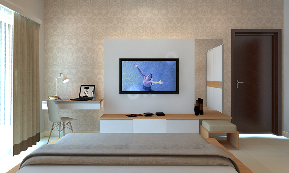 Tv unit attached to a dresser with inbuilt drawer in modern luxury master bedroom designs is premium.