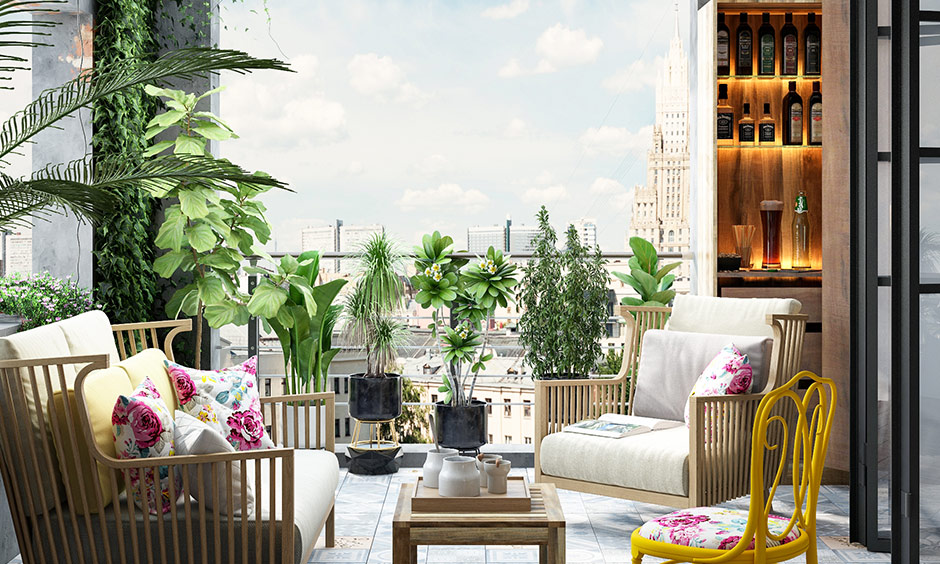 Small balcony decoration ideas convert into a private dinner place, add plants & bar unit