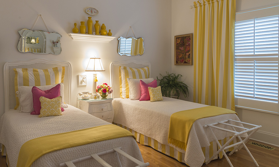 Yellow twin bedroom sets for adults with twin clothing racks in a mini size to hang towels