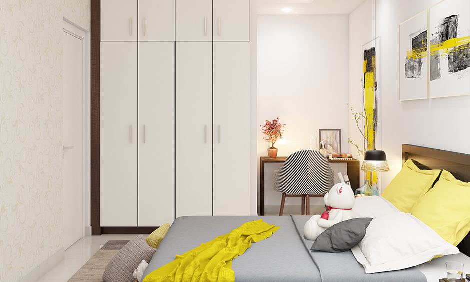 White wardrobe design kids room in a minimalistic style with storage & overhead cabinets looks elegant.