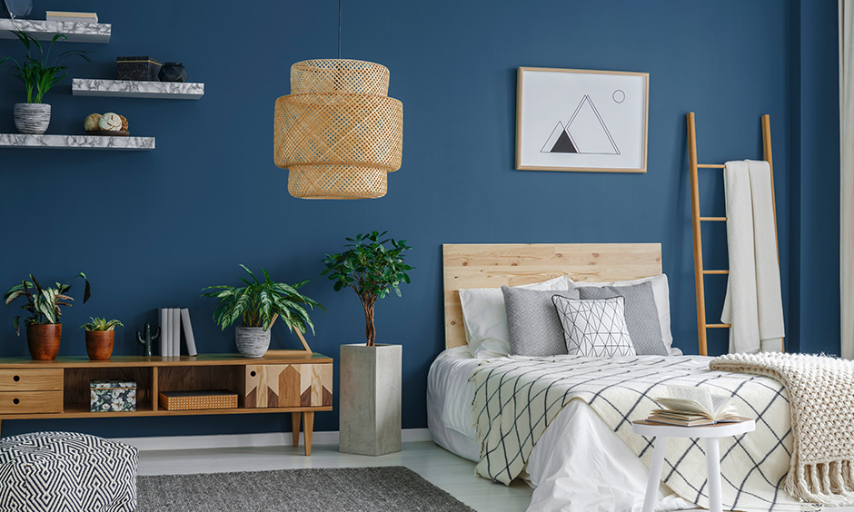 Bright bedroom colors with navy which makes a room feel cosier for bright room colors