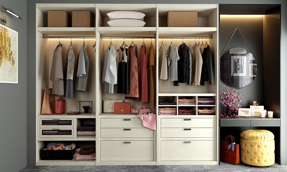 Built-in dressing table decor with a hanging mirror and open wardrobe is perfect
