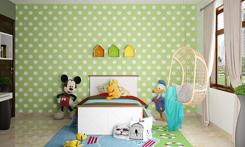 Children's bedroom with three different clocks in the shape of a house in three different colours is bedroom wall art ideas.