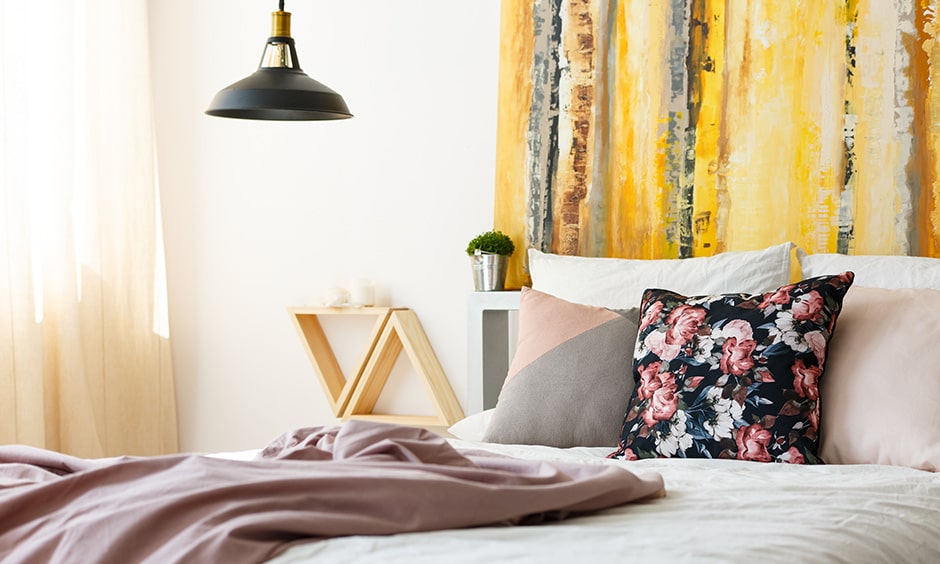 DIY headboard painting with a bold two-tone colour palette or a solid colour