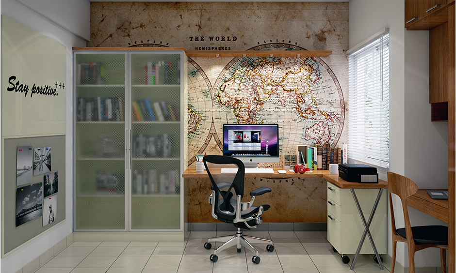 Spacious kids room study table with the world hemisphere sticker on the wall