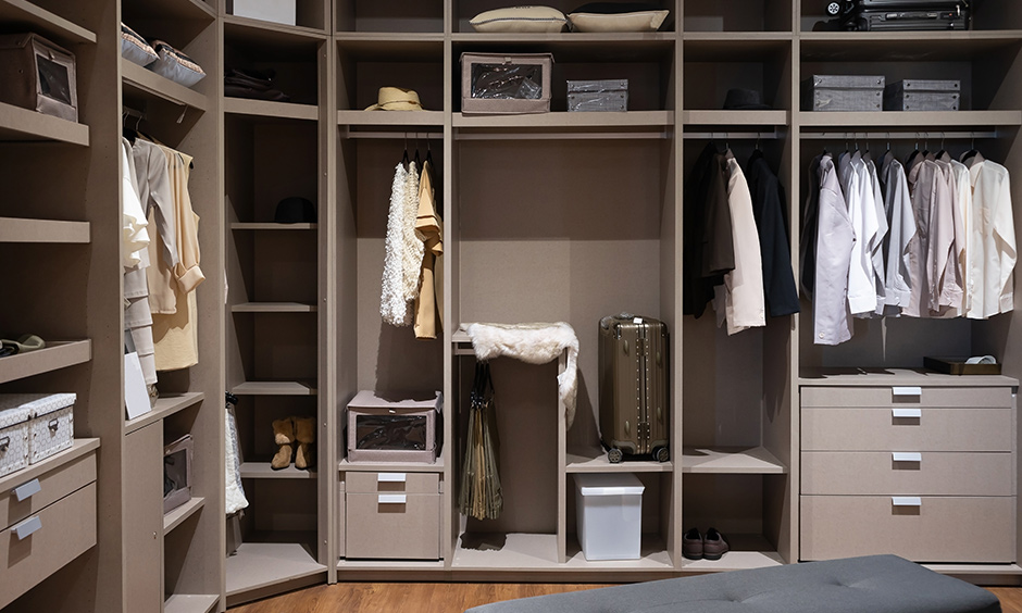 Women's wardrobe design with luggage, jewellery, clothes till all necessities storage option looks smooth and chic.