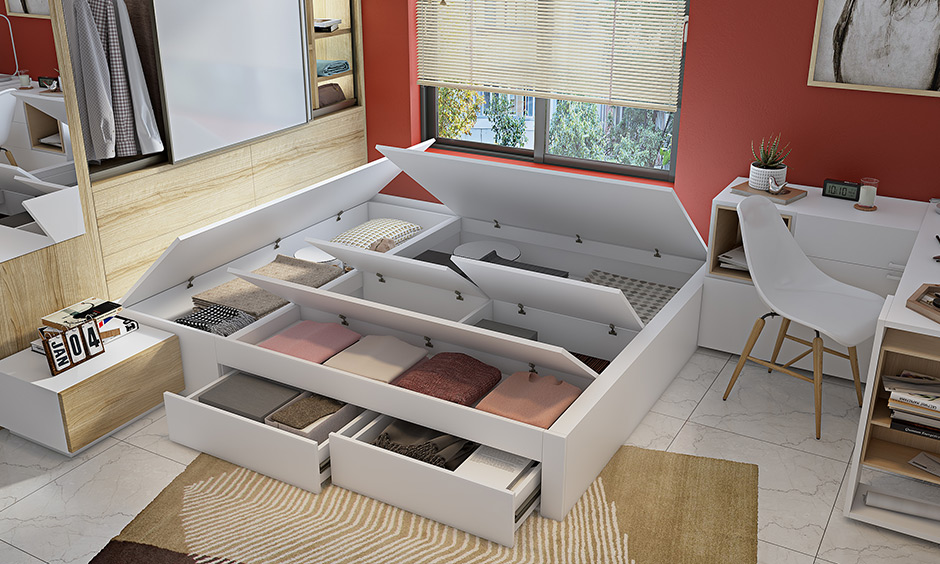 Bed with a great storage option to hide seldom stuffs for clutter-free is space-saving 1bhk interior design ideas