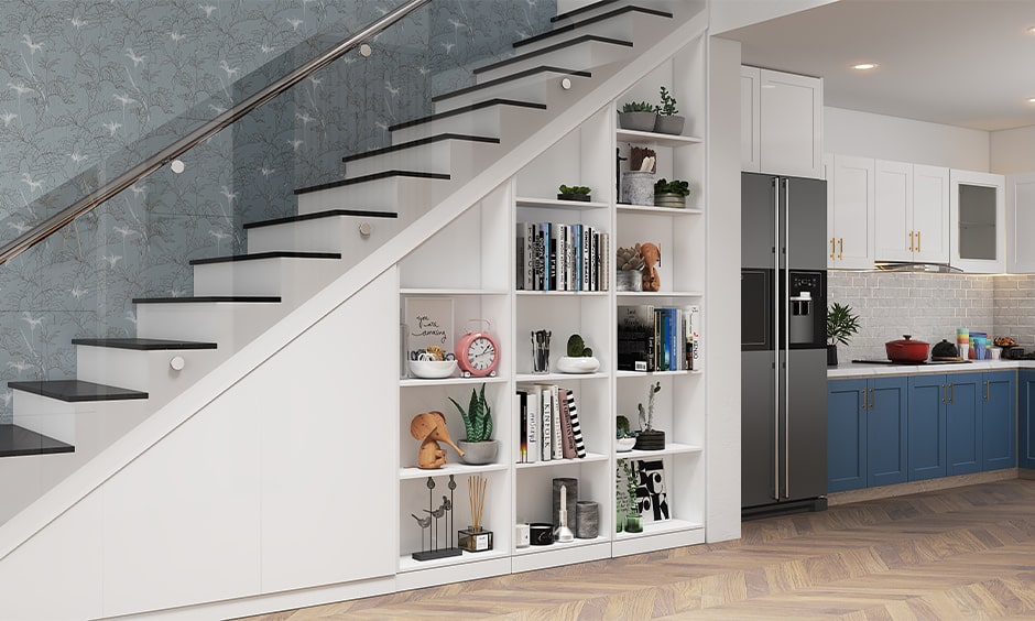 Space saving staircases for small homes with an open bookshelf for storage