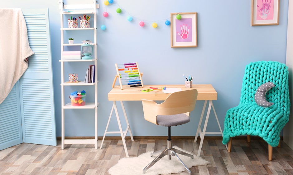 Kids room study table decoration idea with a wooden desk and chair