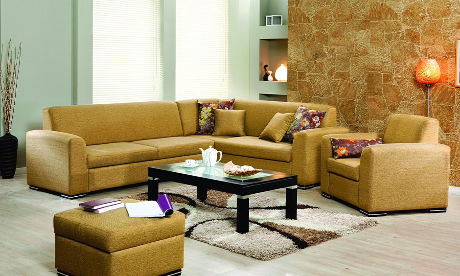 Stunning mustard toned l-shaped sofas has an additional one-seater sofa is perfect sofa design for small living room