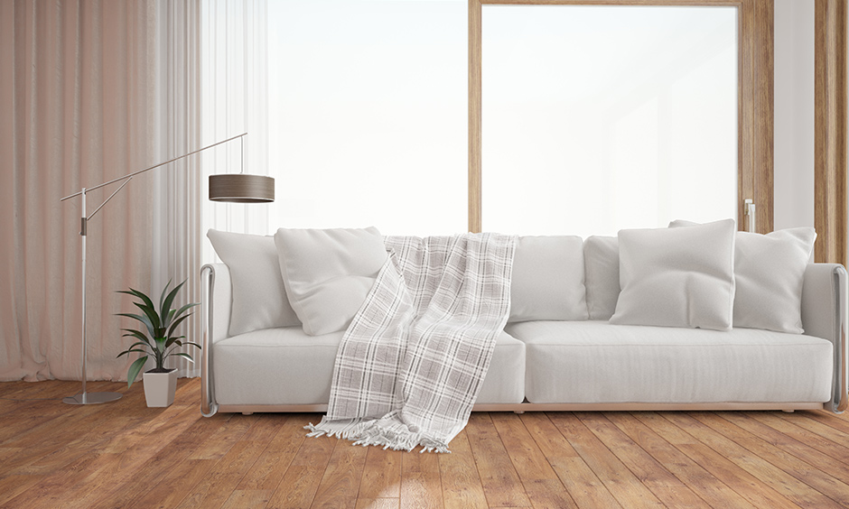 Low-height modern white fabric sofa brings home the farmhouse vibes to your living room.