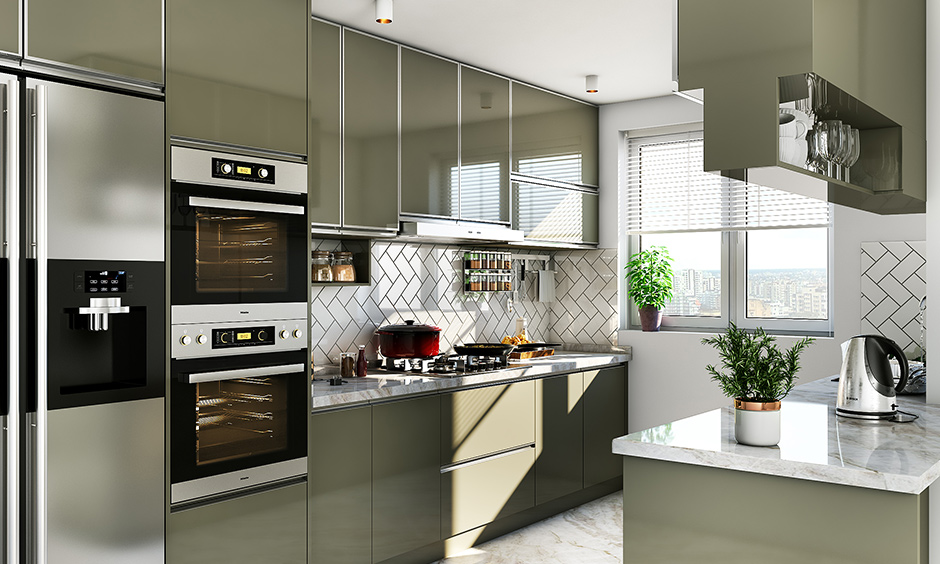 Indian parallel kitchen interior design with everything made up of stainless steel including cabinets, countertops and shelves