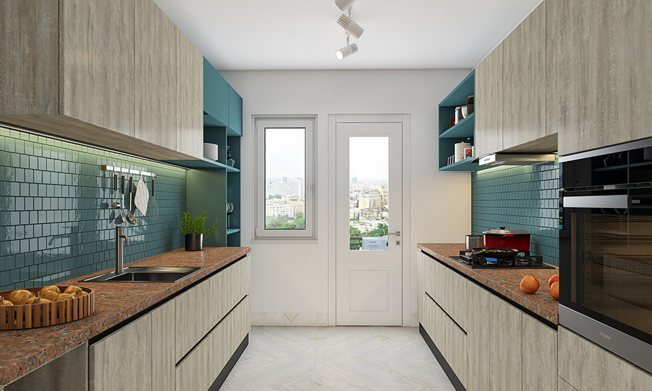 A minimalistic kitchen style of parallel modular kitchen designs in a U shape separated by sink