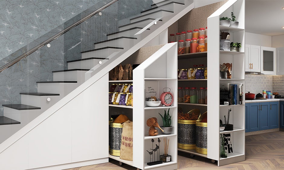 Space saving corner staircase design with a pull out pantry underneath