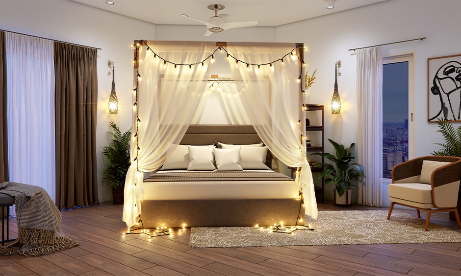 Corner bed design with a canopy in small bedroom with sheers and fairy lights