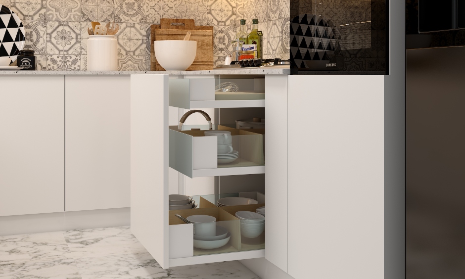 Pull out drawer where all placed crockery and vessels can easily accessed are modular kitchen drawers designs.