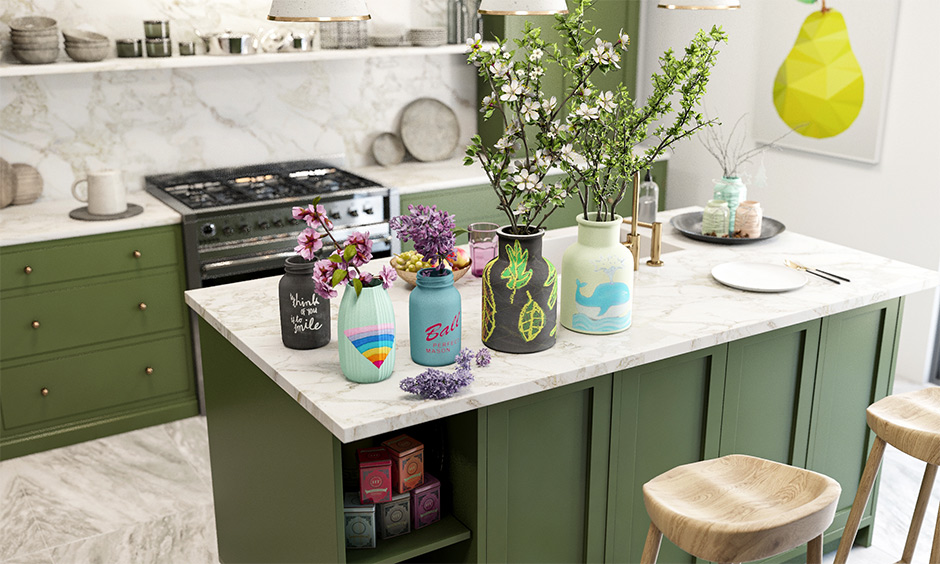 DIY jars and bottles chalk paint in Indian kitchen island in pastel colours and decorated with custom arts