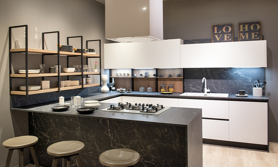 Black marble kitchen countertops with wooden shelves look elite and elegant.